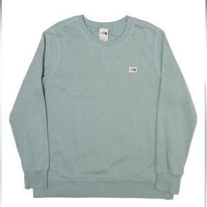The North Face woman’s Green pull over Sweater size Medium